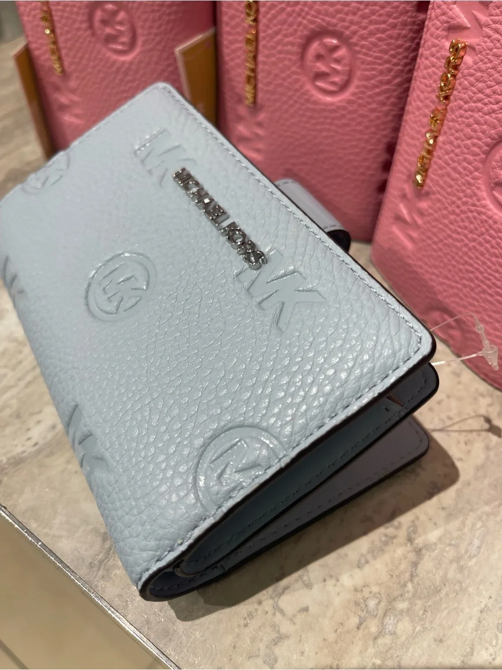 Michael Kors Embossed Logo Trifold Wallet - Light Blue